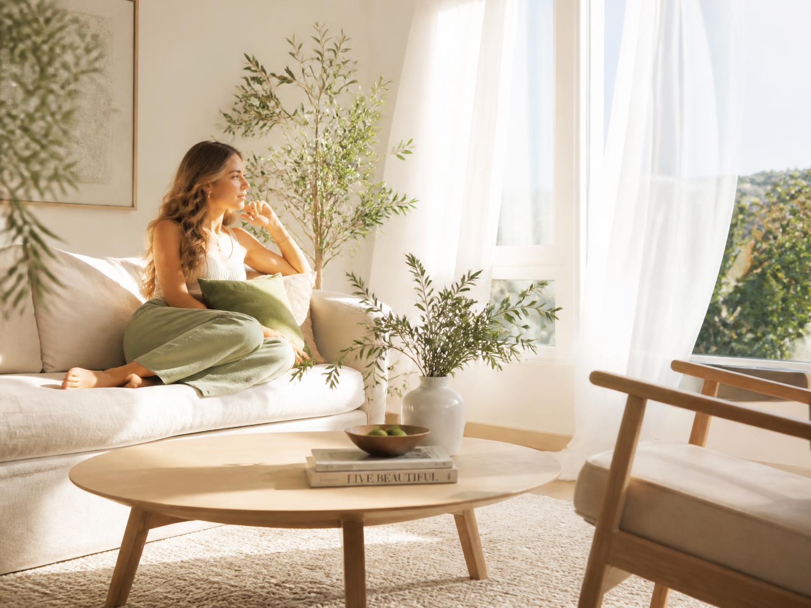 Sunlit living room with fresh plants and clean, fresh air
